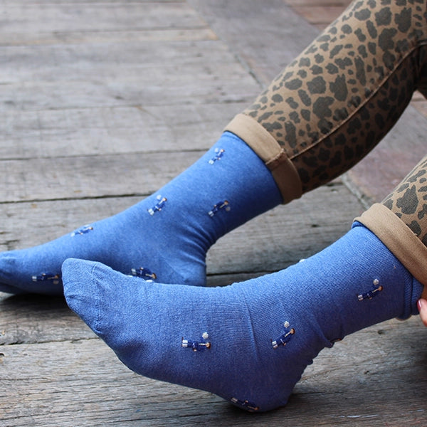 Royal blue cotton blend socks with repeating pattern of Hamlet holding a skull, spaced 1 inch apart