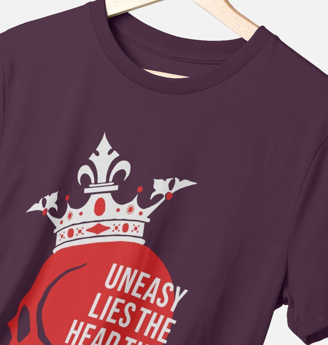 Purple standard fit t-shirt with red graphic skull on centre front wearing white crown with white text overlaid