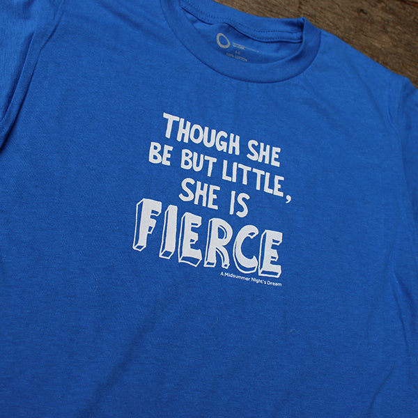 Royal blue children's t-shirt with a white print on a wooden background