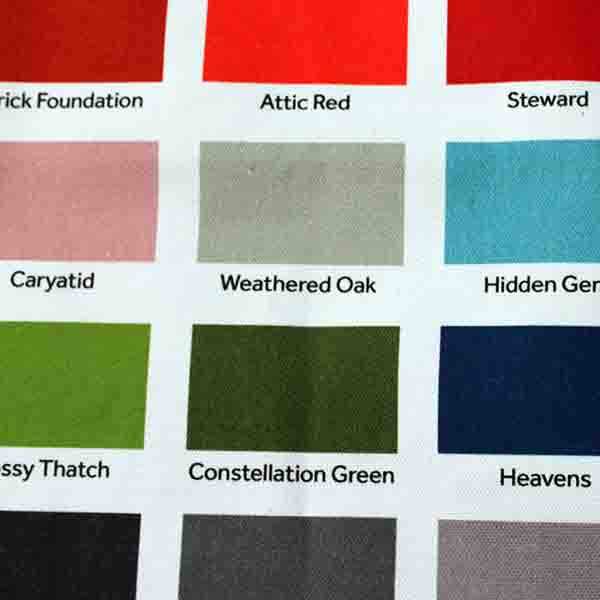 White cotton tea towel, portrait orientation with colour swatches in rows across