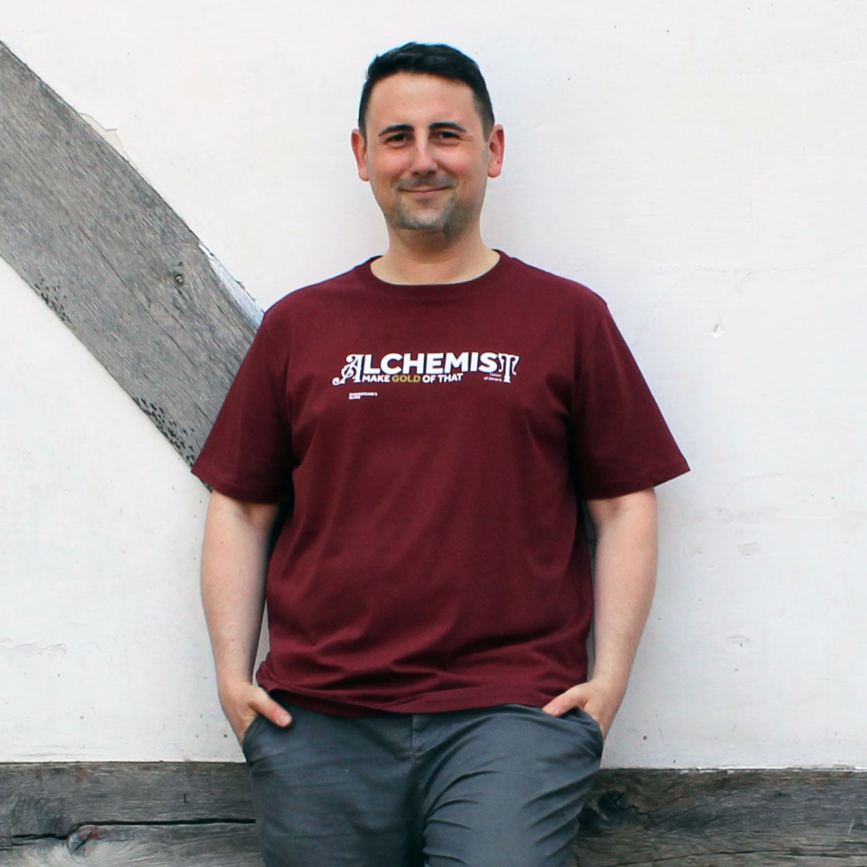 brick red standard fit t-shirt with white graphic text on centre front
