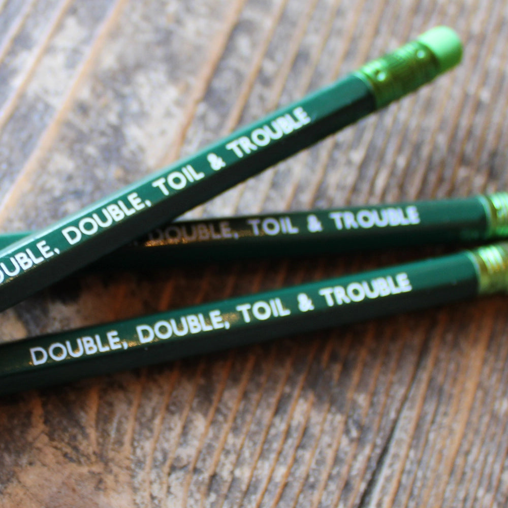 Forest green pencil with lime green eraser, stamped with white text