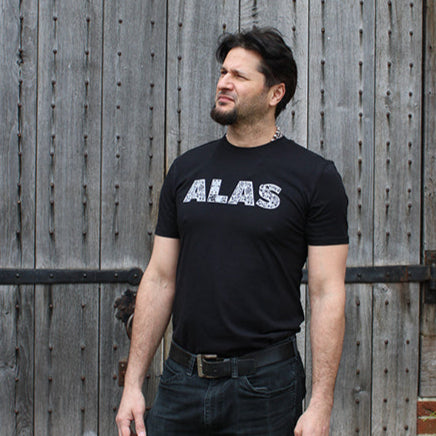 black t-shirt with an intricate text print on the chest in white
