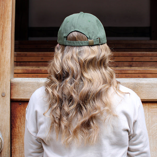 Khaki green six-panel baseball cap with an expanding back for comfortable fit