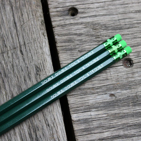 Forest green pencil with lime green eraser, stamped with white text
