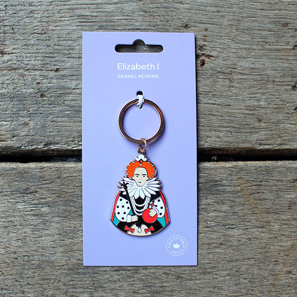 Multi-coloured keyring of Elizabeth I cartoon character on silver metal keying, on purple backing card, sitting on Globe stage