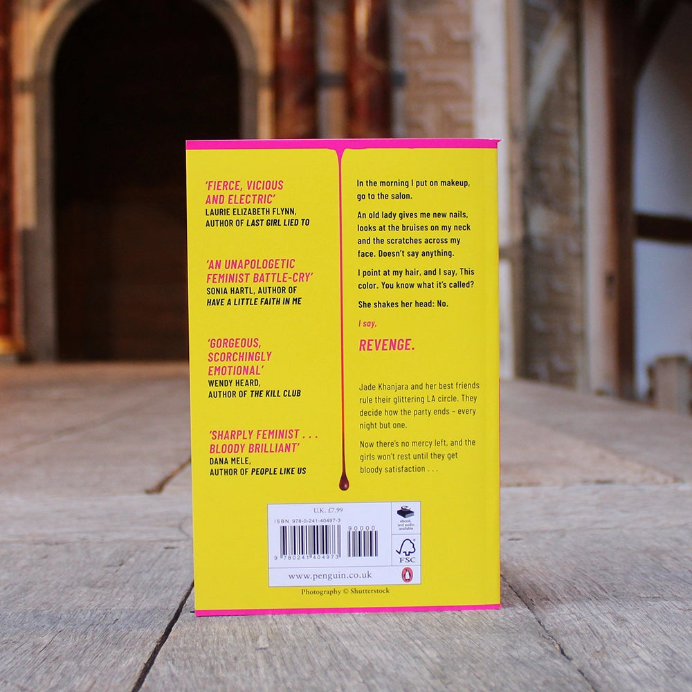 Canary yellow paperback book with bold black text