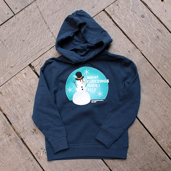 Navy blue hoodie with a snowman design on a wooden surface