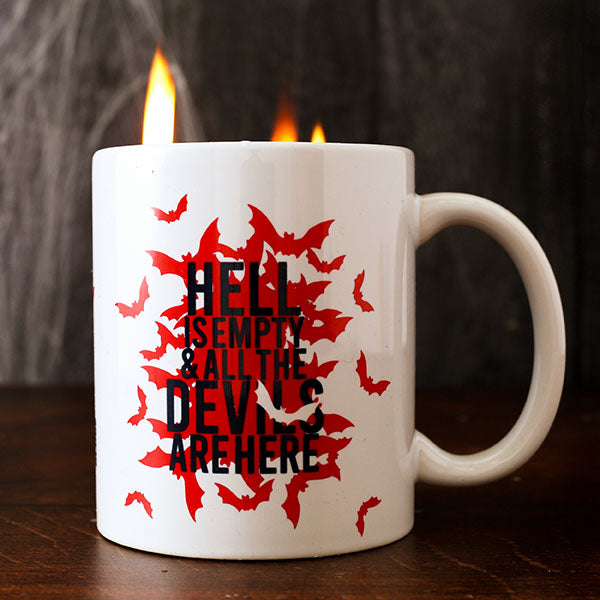 White mug with red bats graphic on either side, with black text overtop