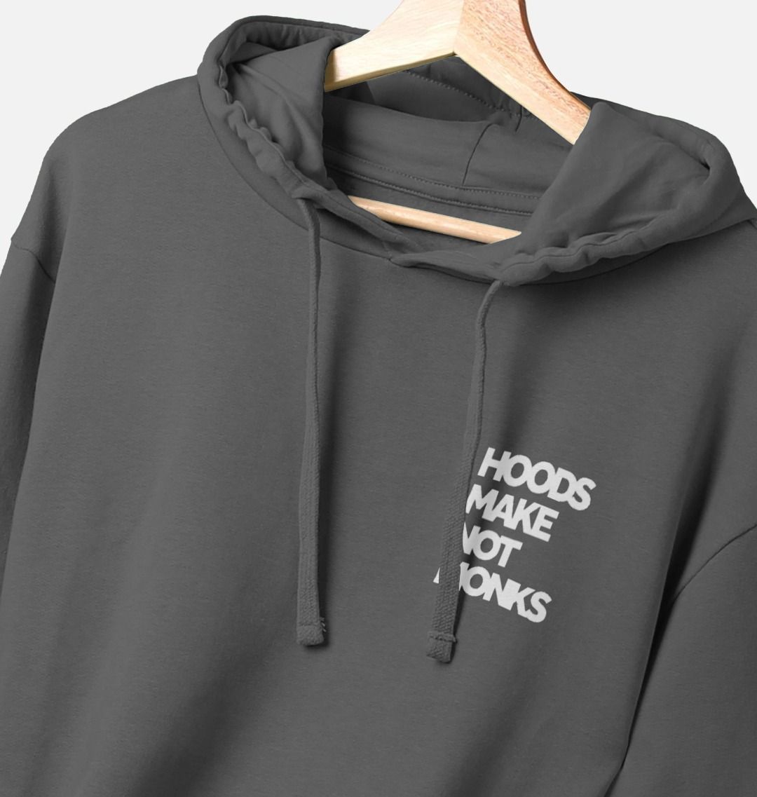 Grey cotton hoodie with a print on the upper left chest of a quote in heavy white text