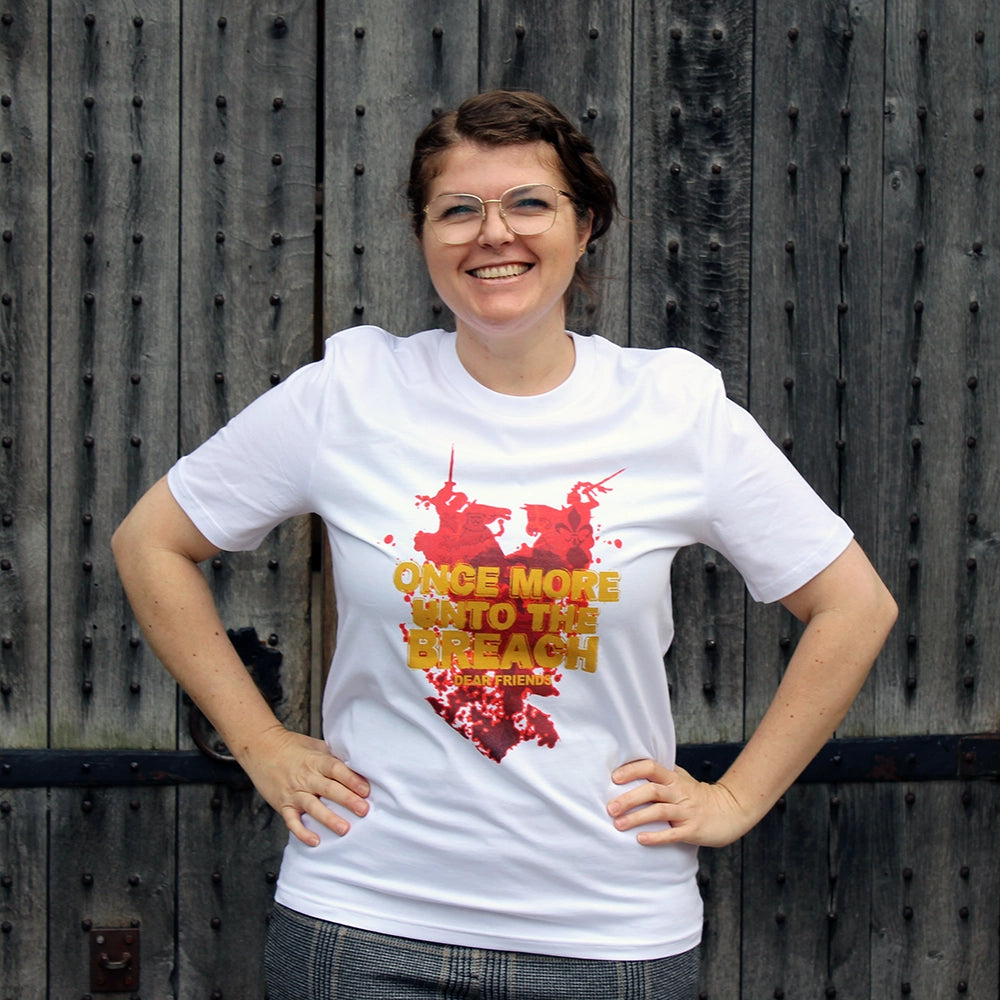 White t-shirt with red graphic of two knights on horseback and gold text overlayed