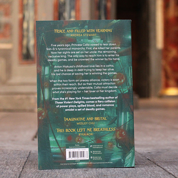 Red and green paperback book showing city street from an angle above, with white text