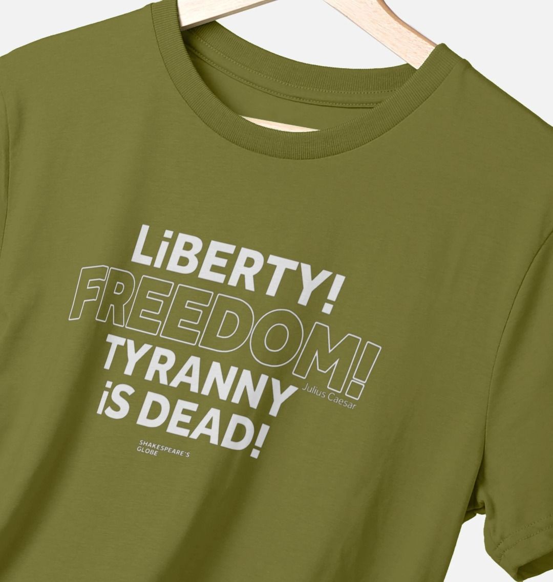 Green standard fit t-shirt with centre front graphic text in white colour, all letters filled in except for the word Freedom which is outlined in white only