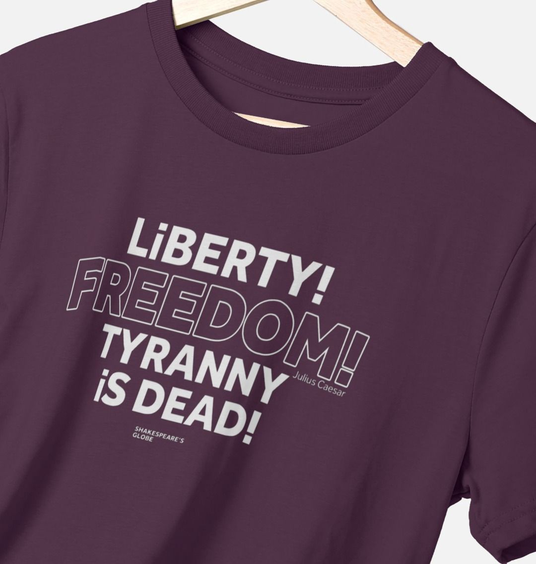 Purple standard fit t-shirt with centre front graphic text in white colour, all letters filled in except for the word Freedom which is outlined in white only