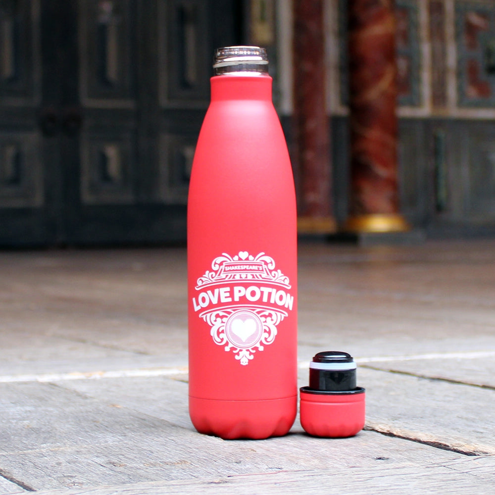 Matt red metal drinks bottle with a white print