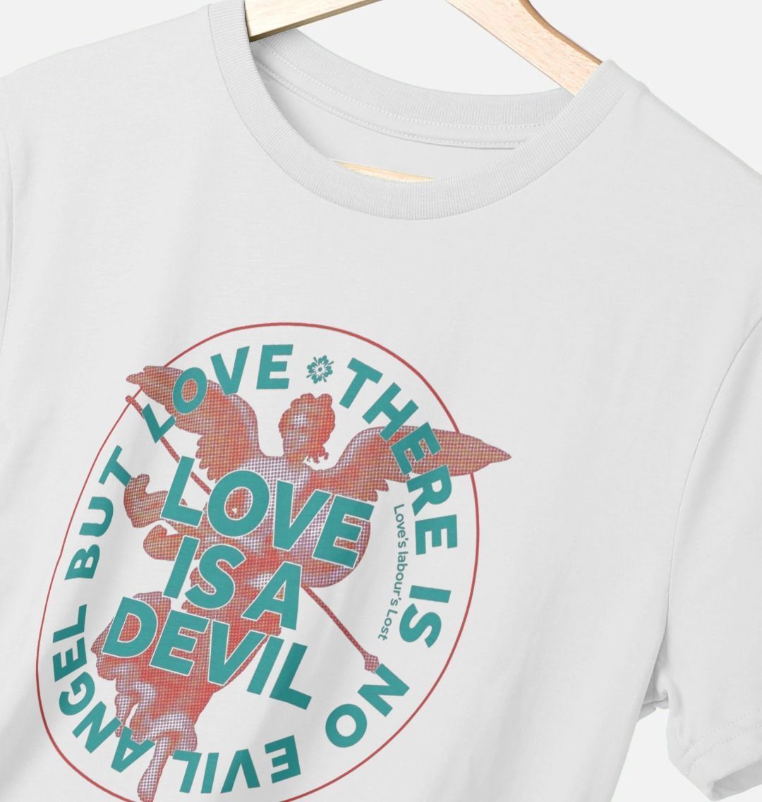 White t-shirt with graphic design featuring text and an angel figure on a hanger.