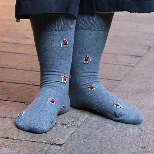 Marled grey cotton blend socks with repeating pattern Macbeth approximately 1 inch apart