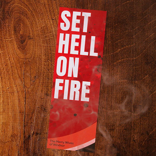 large card bookmark with a red and white print