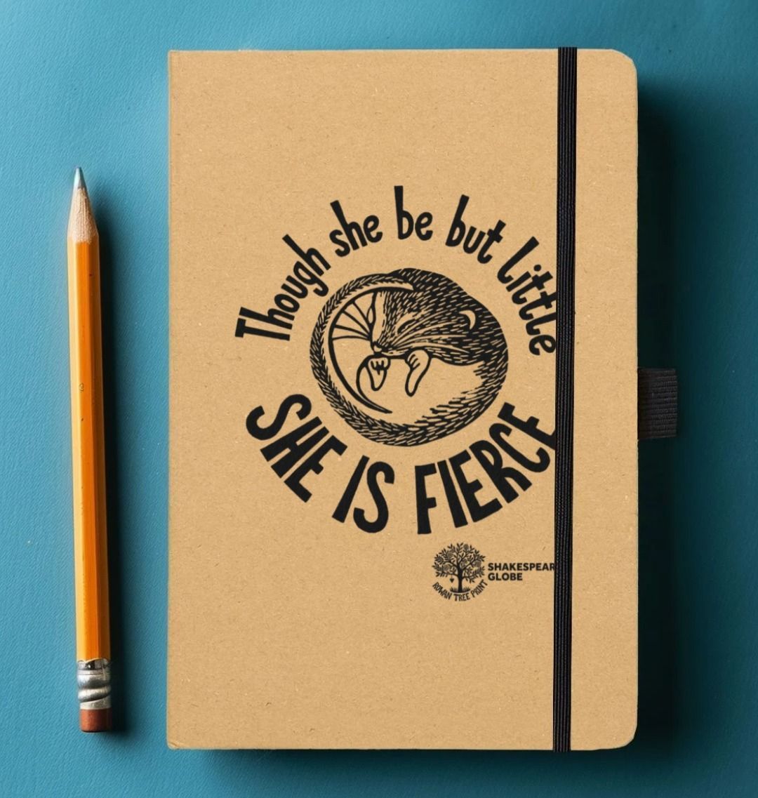 Notebook with 'She is Fierce' quote on a blue background
