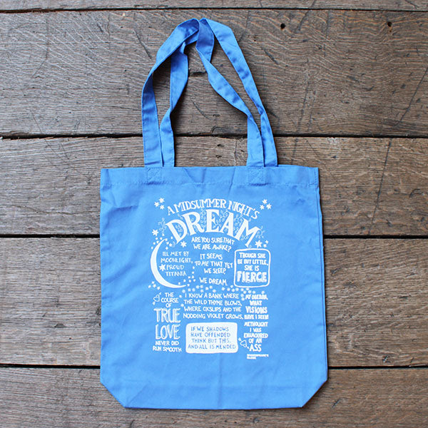 blue two handle tote bag with white front graphic text depicting A Midsummer Night's Dream