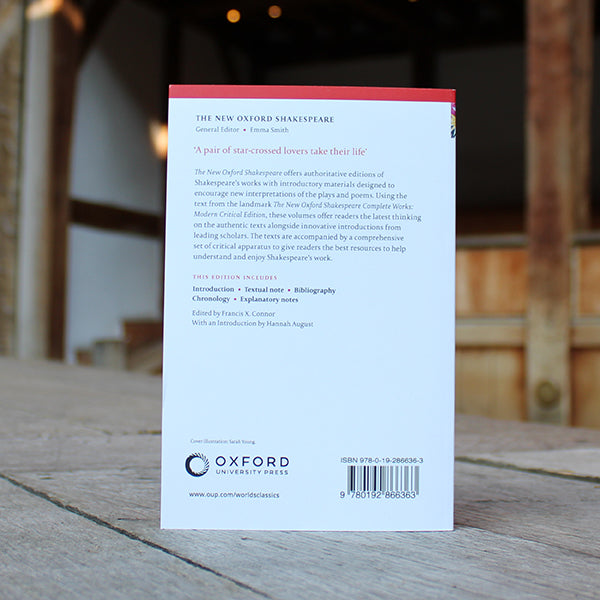 White paperback book back with black text