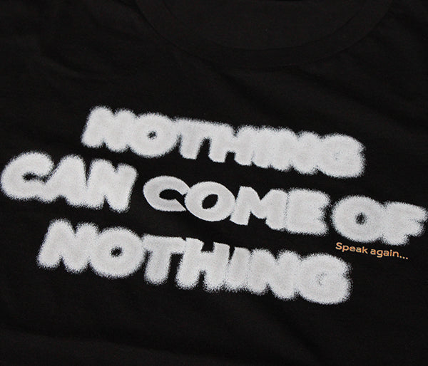 Black cotton t-shirt with white blurred text