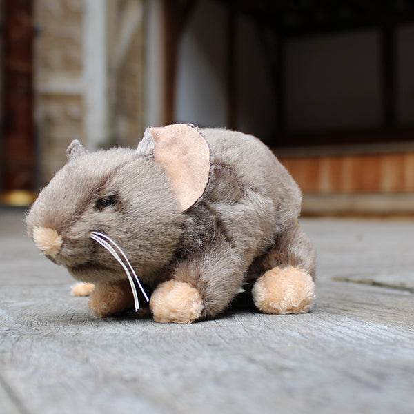 Pale brown soft toy in a rat shape with beige feet, tale, nose and inner ears