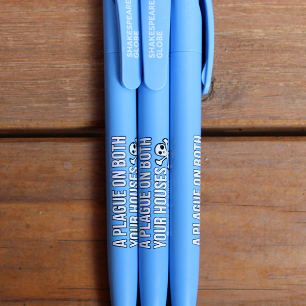 Powder blue pen with white graphic text with black outlines and skull and crossbones