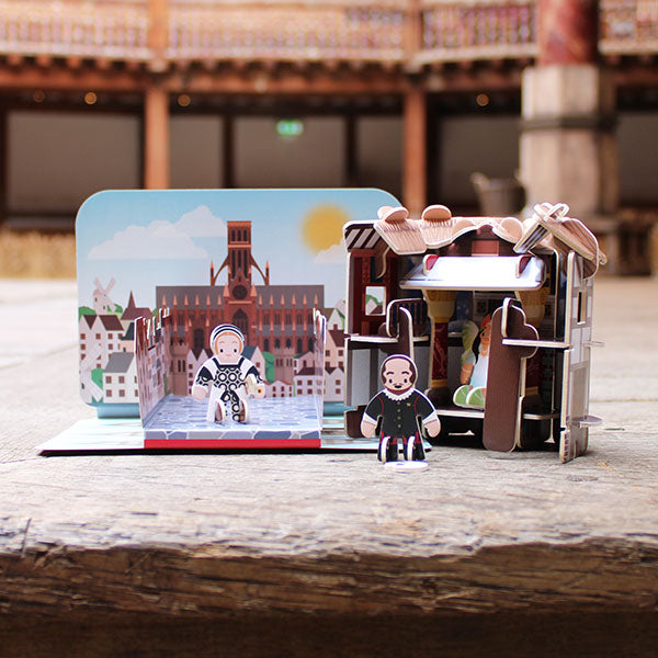 building kit of the Globe Theatre with small figured and a backdrop of old London