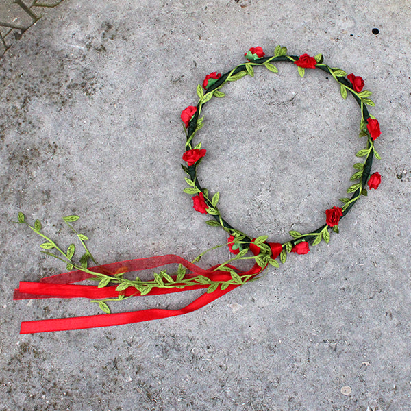 Faux flower, flower crown with greenery and red flowers and ribbons