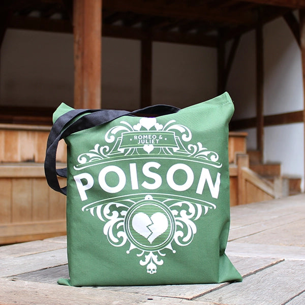 Olive green cotton tote bag with 2 black handles, featuring white graphic and POISON text