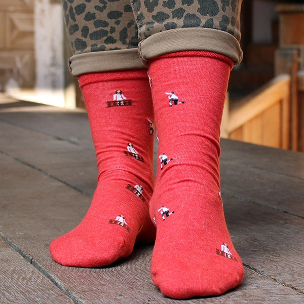 Red cotton blend socks with repeating images of Romeo kneeling and Juliet in her balcony