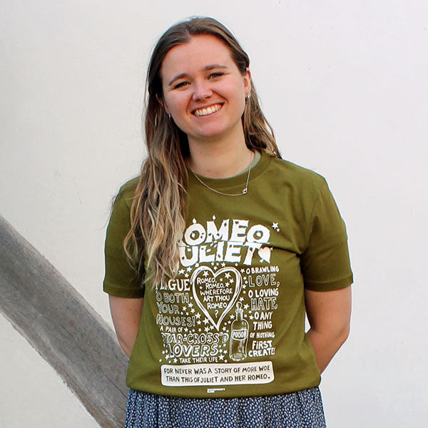young woman wearing a green t-shirt with a white text print to the front