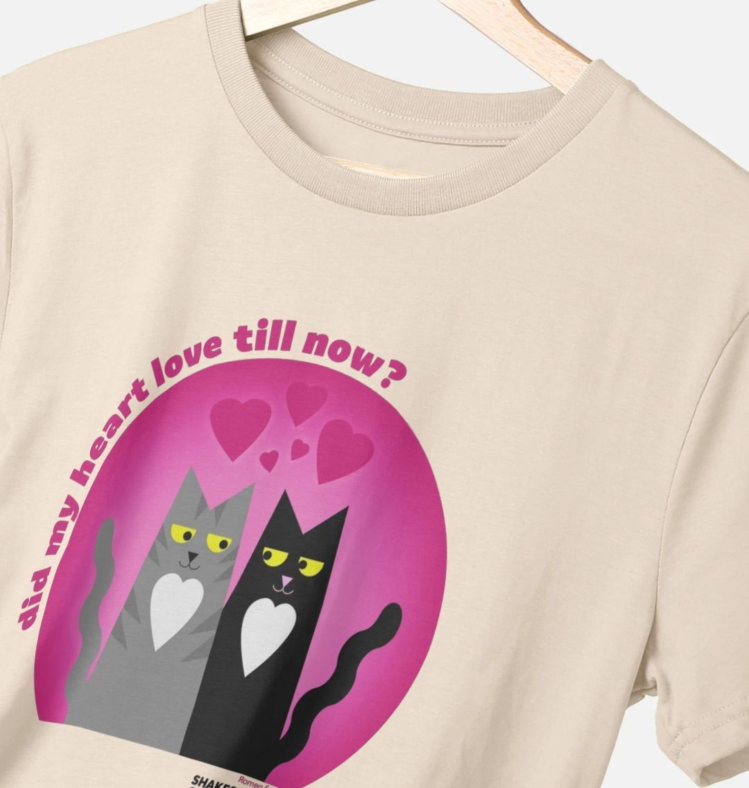 oat coloured t-shirt printed with a pink circle in which sit a grey tabby cat and a black cat