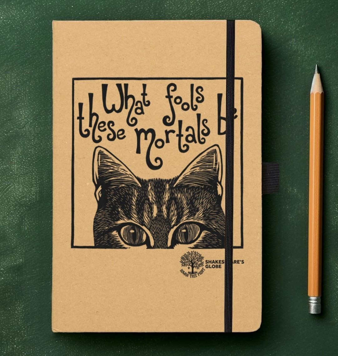 Notebook with cat illustration and text on a green background