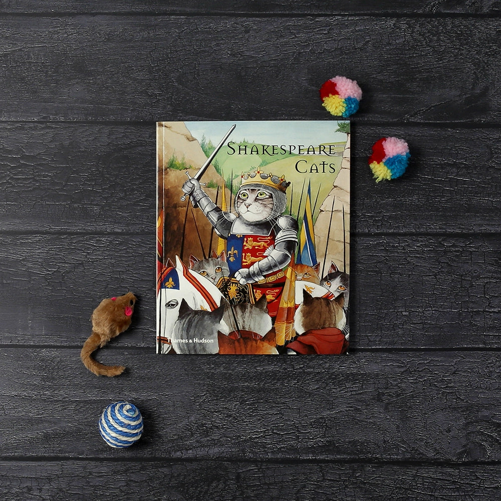 Paperback book with a picture of a tabby cat dressed as Henry V on the cover.