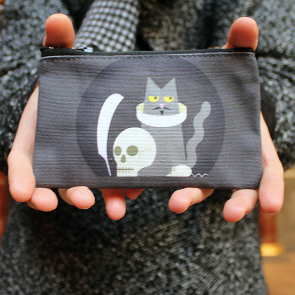 Grey cotton purse with black zipper on top and black circular graphic on the centre front and back with Shakespeares cat