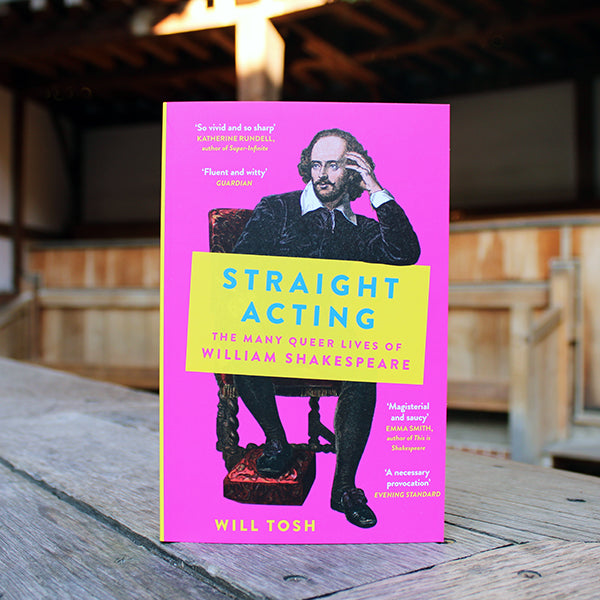 Hot pink paperback book with yellow accents, with William Shakespeare sitting on the front