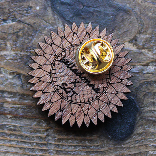walnut wood brooch  with a gold coloured metal butterfly clip