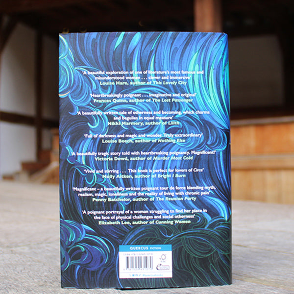 A book with a blue cover featuring images of waves