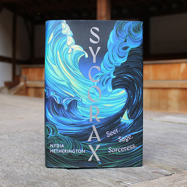 A book with a blue cover featuring images of waves