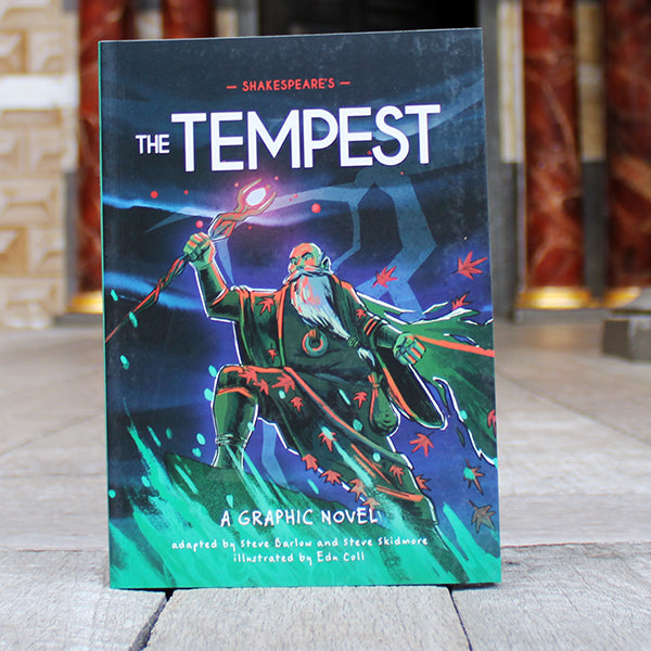 Blue and green paperback book with graphic image of wizard holding staff and white text