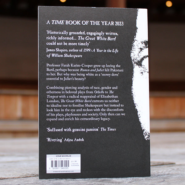 White and black paperback book back, all black with white text