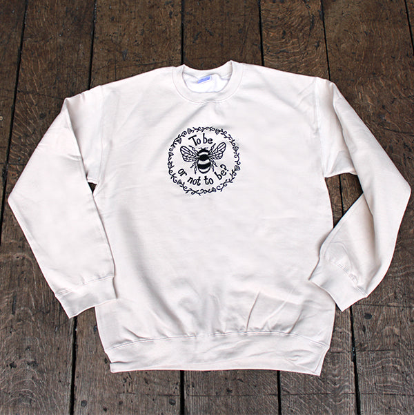 Sand coloured unisex sweatshirt with bee graphic black print in centre front