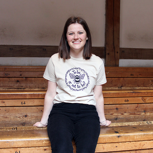 Cream fitted t-shirt with circular graphic in centre front with bee image