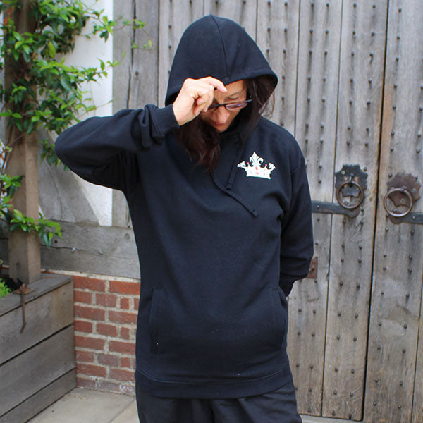 Black hoodie with red and white upper left chest graphic crown design, white with red accents