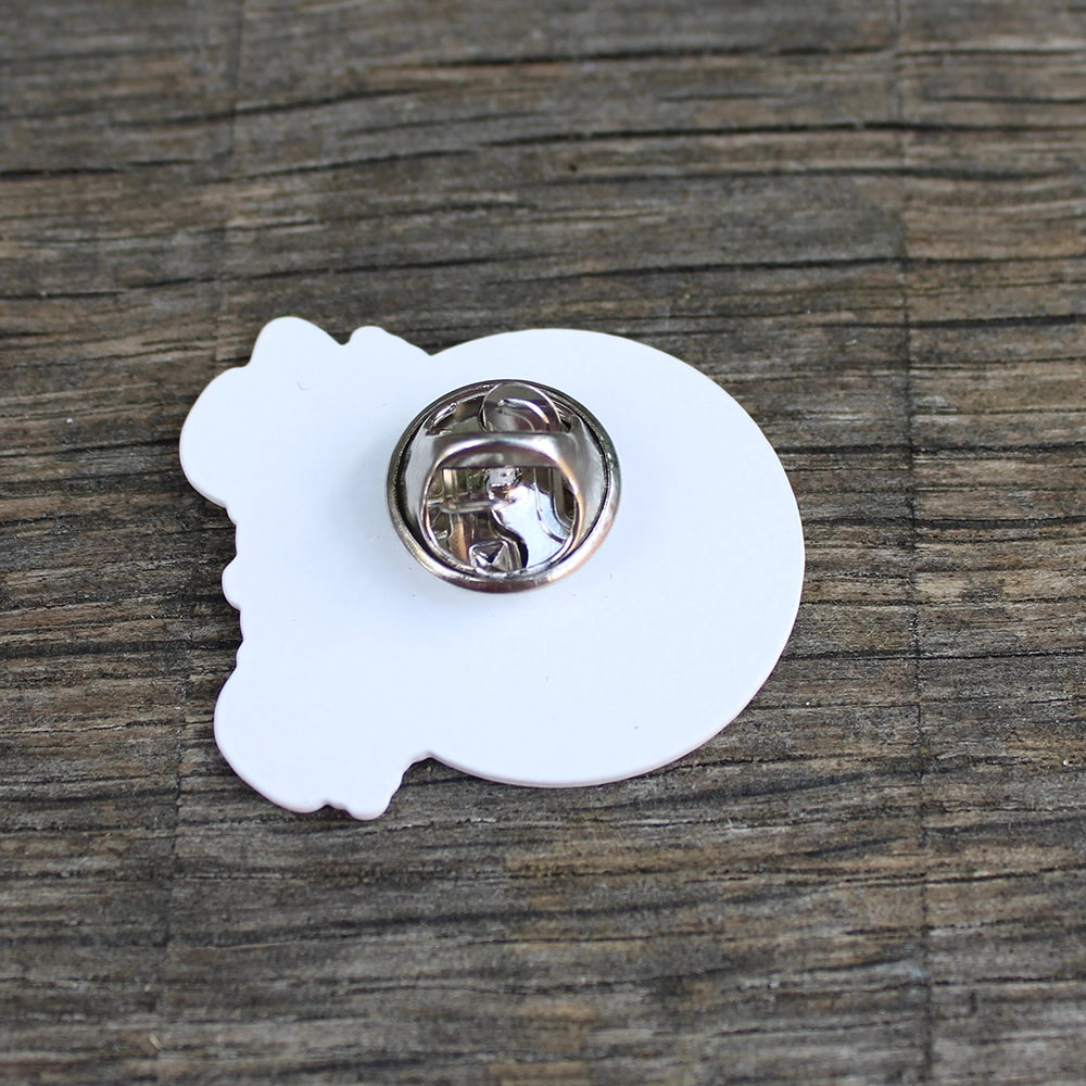 White pin badge back with metal pin closure