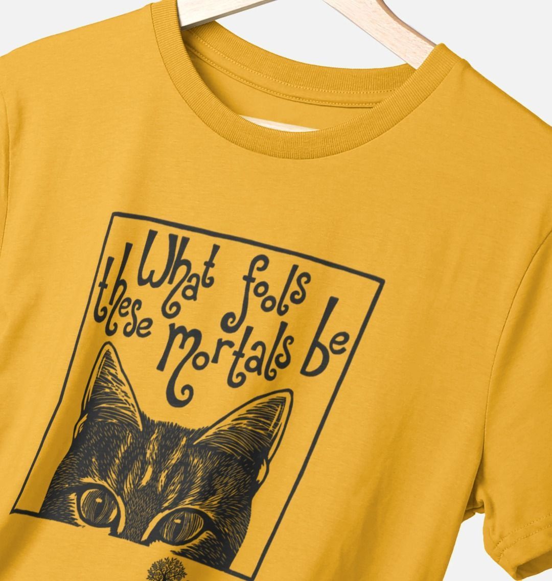 Yellow t-shirt with black cat illustration and text on a white background