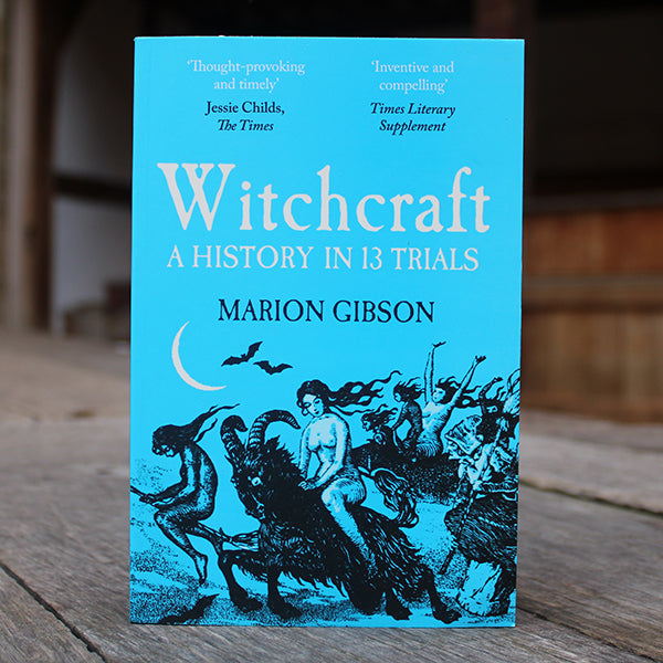 Bright blue book with white text and black graphics