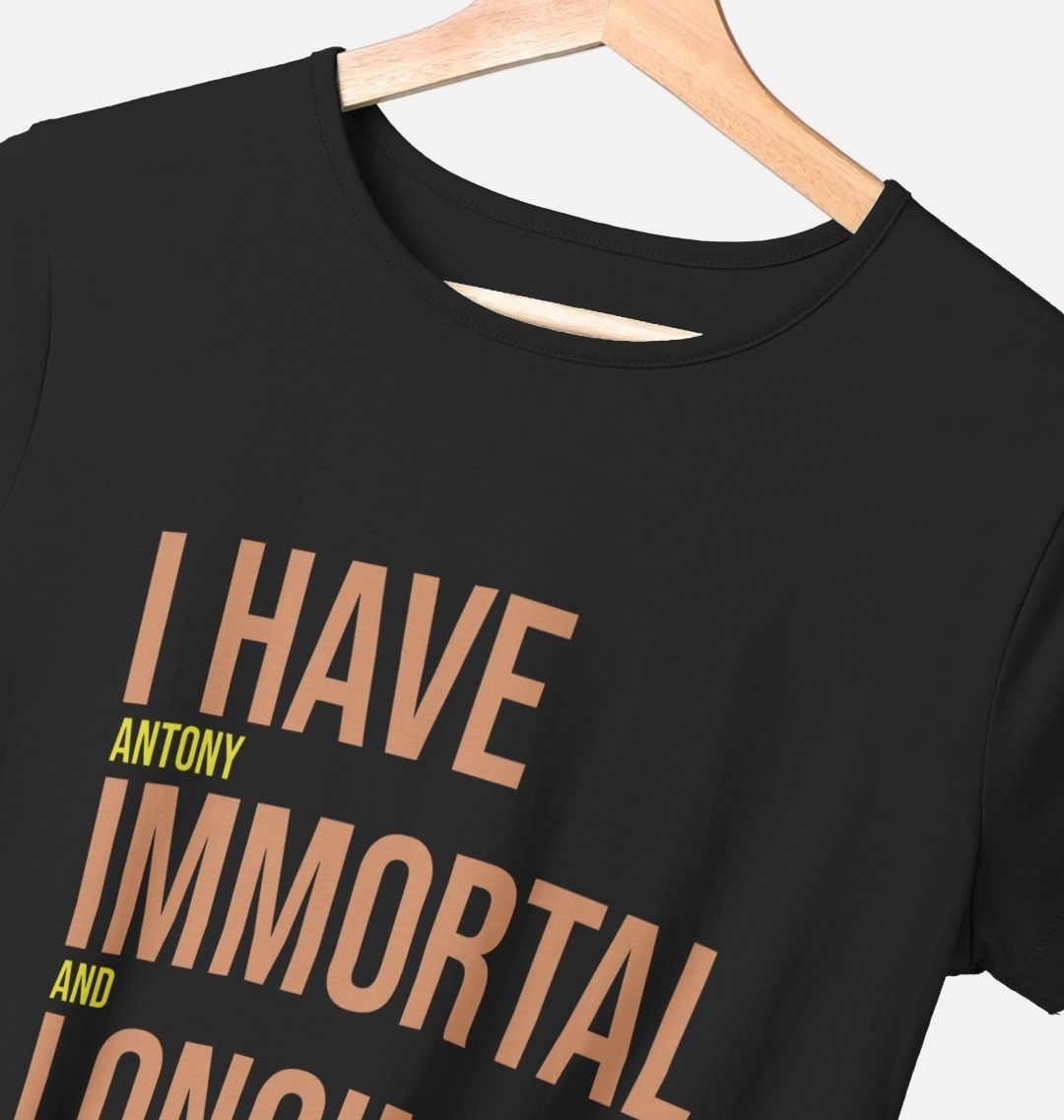 black women's fit t-shirt with orange and yellow block text across the front